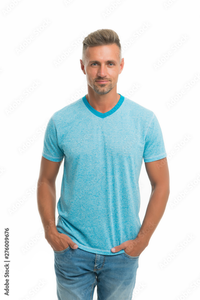 Fototapeta premium Adding some personality with the right style. Handsome man with unshaven face and iconic hair style. Caucasian guy wearing casual summer style. His haircut and style work really well
