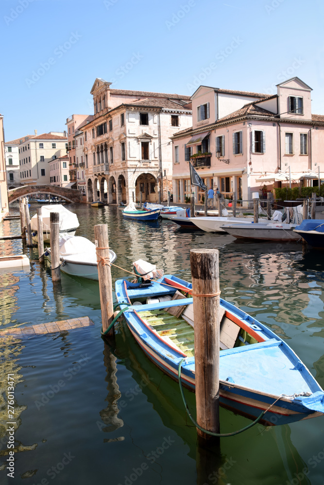 Typical houses of the Venetian lagoon overlooking a canal in Chioggia - Italy