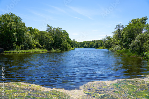 Obraz na plátně beautiful blue waters of Shawme Pond near the gristmill in Sandwich, Massachuset