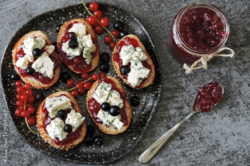 Toasts with currant jam and blue cheese. Keto toasts Keto diet. Flat Lay.