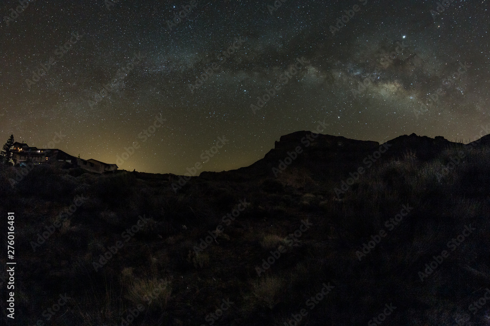 Shot of stars and milky way at hight sky via fish eye lens. Long Exposure. National Park Teide, Tenerife