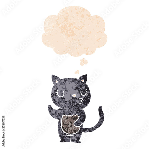 cute cartoon cat and thought bubble in retro textured style