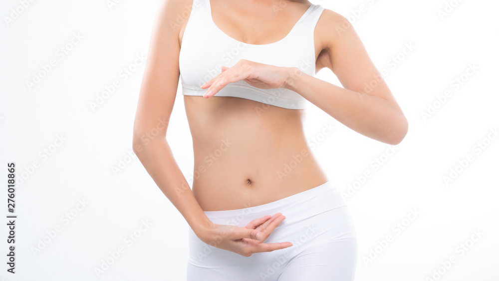 Close up woman beautiful body diet with hands around her stomach for copy space isolated on white background.