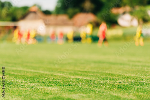 Blurred background with soccer players training