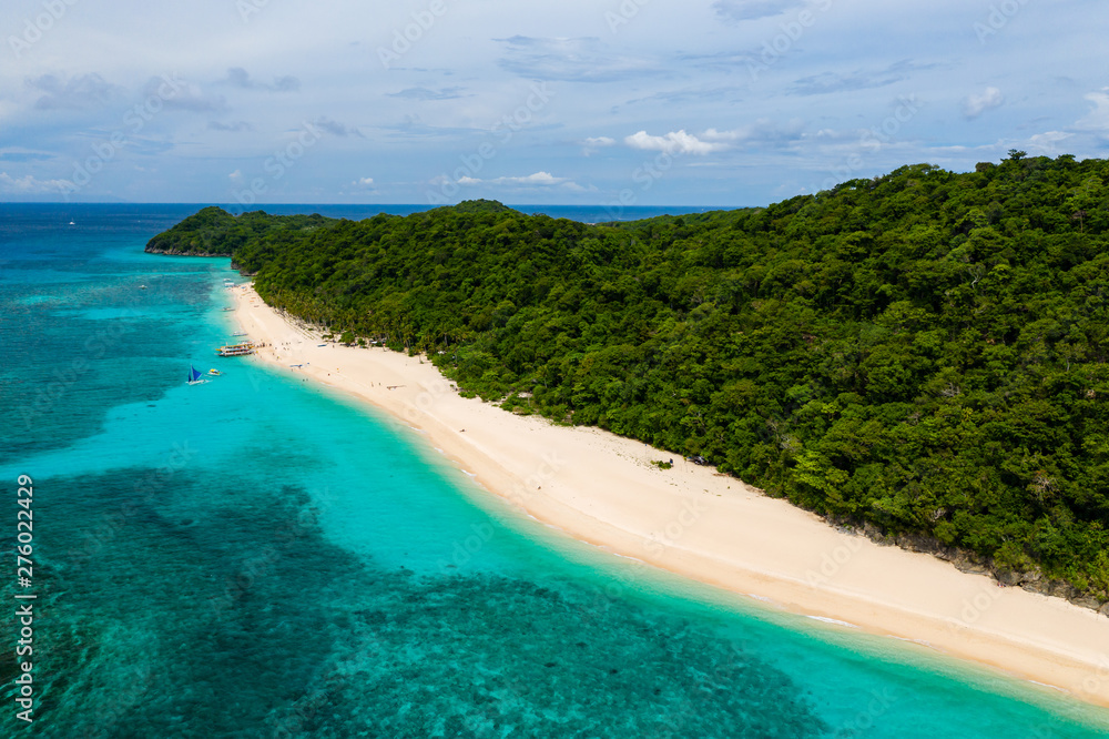Aerial view of a beautiful, quiet tropical sandy beach (Puka Shell Beach, Boracay)