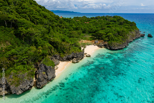 Aerial view of a beautiful, quiet tropical sandy beach (Puka Shell Beach, Boracay) photo