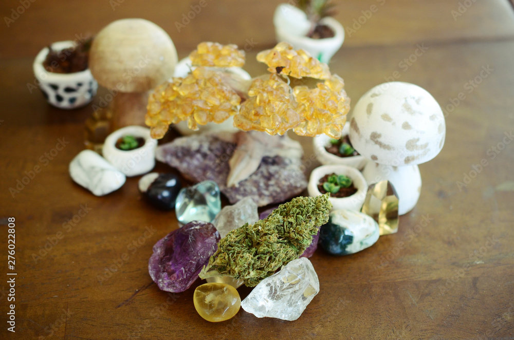 Cannabis and Crystals. Marijuana flower with healing crystal assortment. Citrine crystals. Medical Marijuana, legal cannabis. Reiki healing stones, wiccan culture. Beautiful crystals, THC ganja. Cannabis and Crystals. Marijuana flower with healing crystal assortment. Citrine crystals. Medical Marijuana, legal cannabis. Reiki healing stones, wiccan culture. Beautiful crystals, THC ganja.
