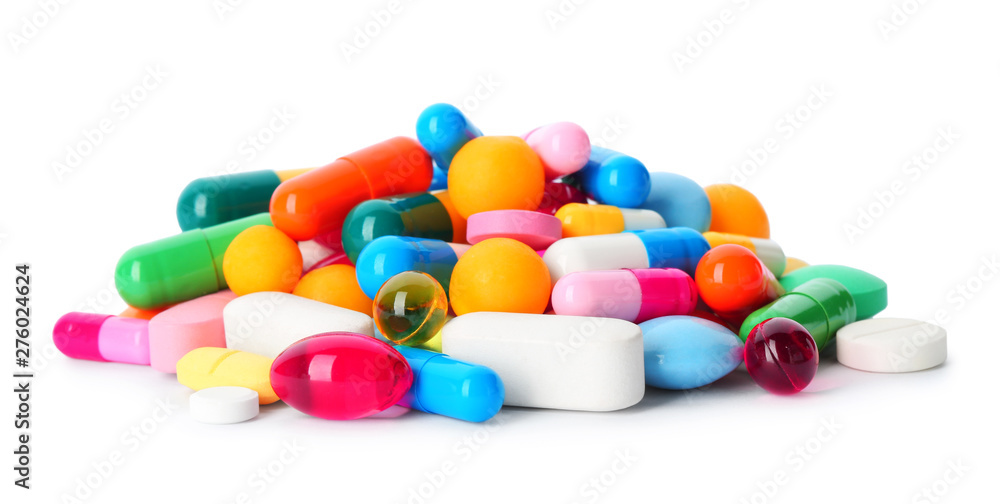 Pile of pills on white background. Medical treatment - obrazy, fototapety, plakaty 