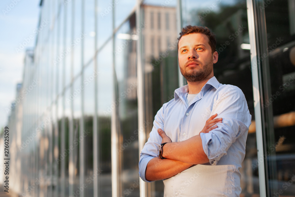 Portrait of sales representative. Logistics manager waiting his business partner to have a deal. Concept of warehouse outdoor and transportation services. . Portrait of sales representative. Logistics manager waiting his business partner to have a deal. Concept of warehouse outdoor and transportation services. .
