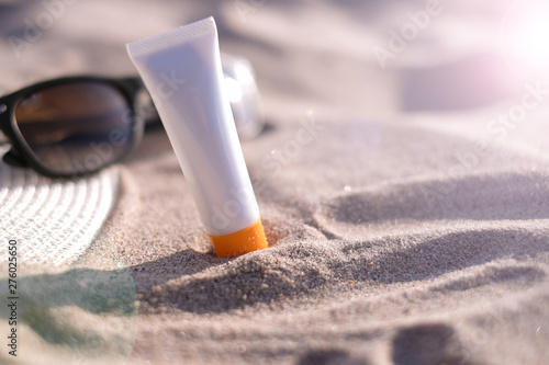 woman sunscreen beach summer sun protection. photo