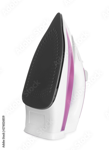 Modern electric iron on white background. Household appliance