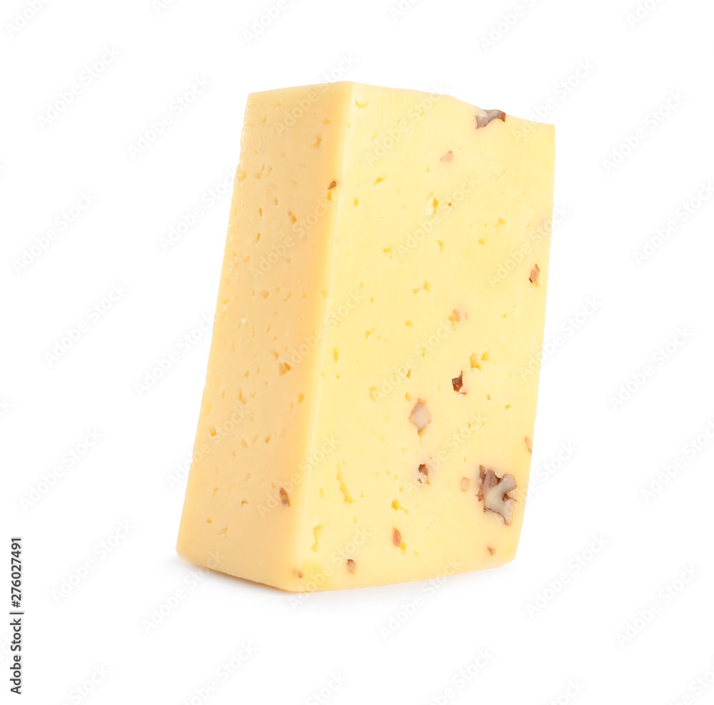 Piece of delicious cheese with nuts on white background