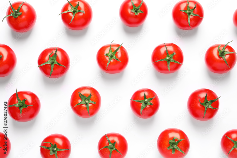 Composition with ripe cherry tomatoes on white background, top view Composition with ripe cherry tomatoes on white background, top view