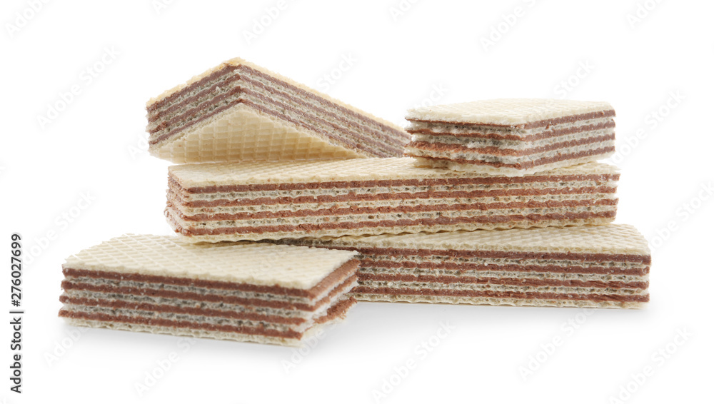Delicious wafer sticks with chocolate filling isolated on white Delicious wafer sticks with chocolate filling isolated on white