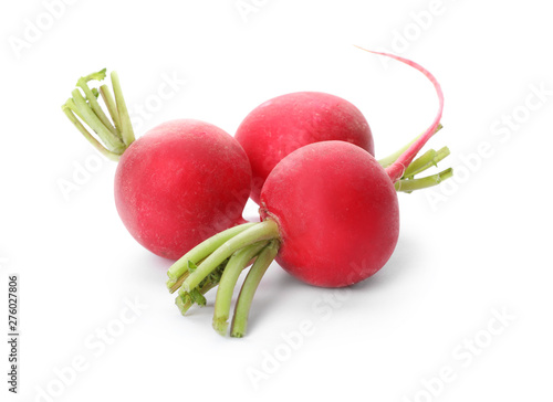 Fresh tasty ripe radishes isolated on white