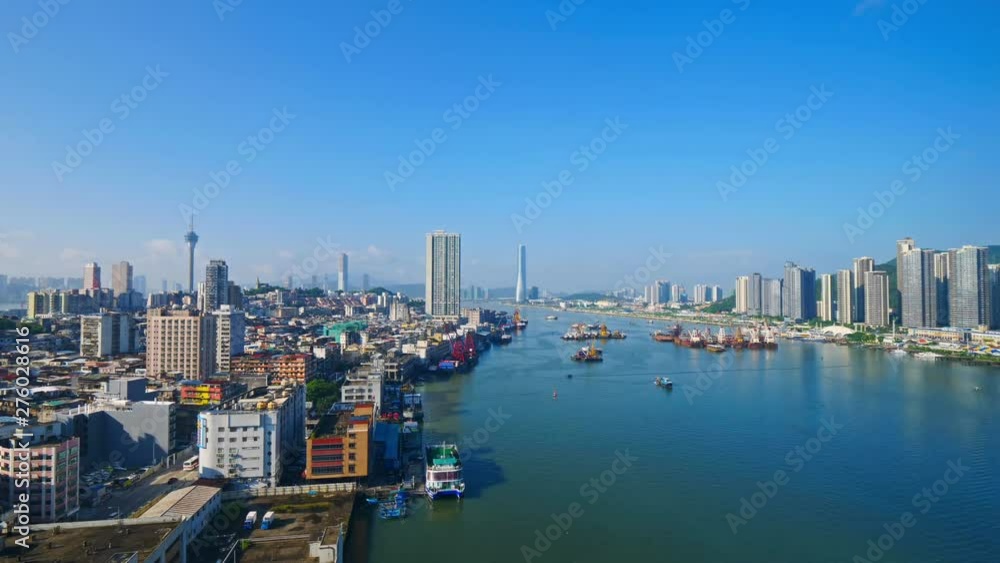 Time Lapse of both land and water traffic moving along in the modern city of Macau China Time Lapse of both land and water traffic moving along in the modern city of Macau China