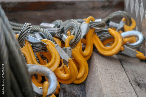 Yellow Grade 80 Sling Hooks attached to eye on Wire Rope Slings photo