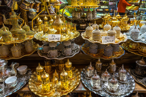 Typical tea sets with teapots and tea glasses for sale on sale at at Istanbul Spice Bazaar (Egyptian Bazaar), Turkey .