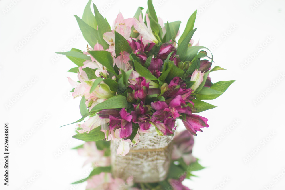 Flowers in the vase reflected in the mirror Flowers in the vase reflected in the mirror