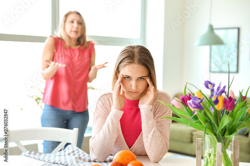 Quarreling mother and daugh...