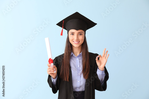 Female graduate with diplom...