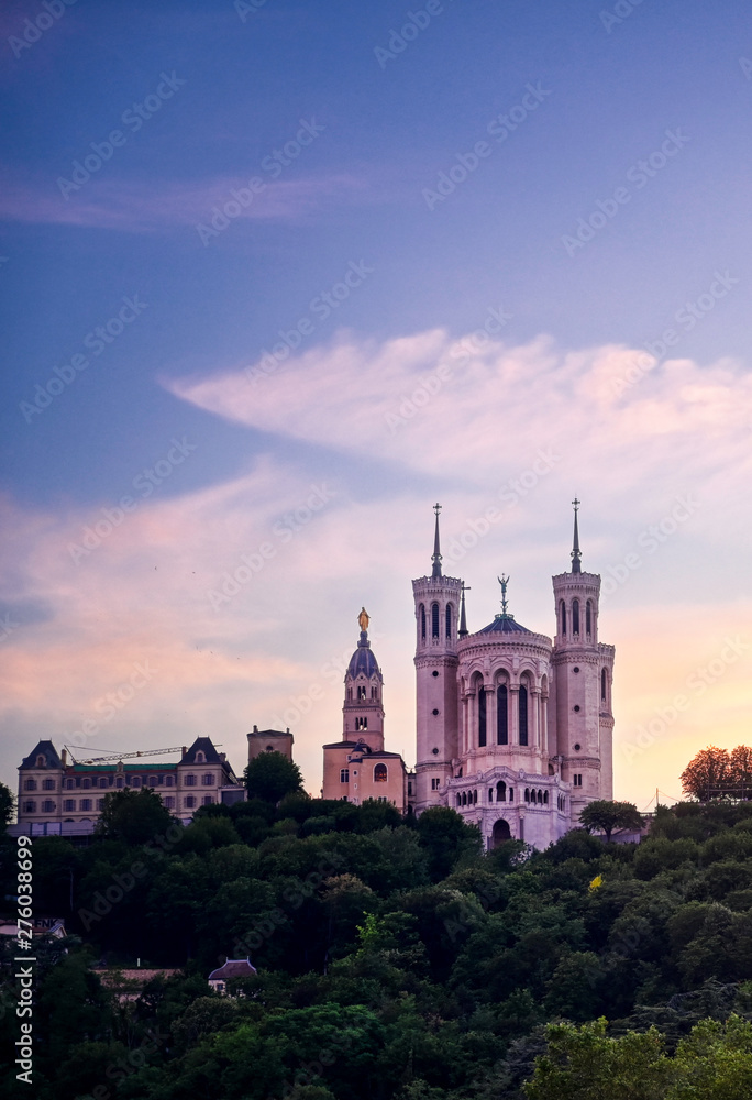 Lyon, France and the Basilica of Notre-Dame de Fourvière at sunset. Lyon, France and the Basilica of Notre-Dame de Fourvière at sunset.