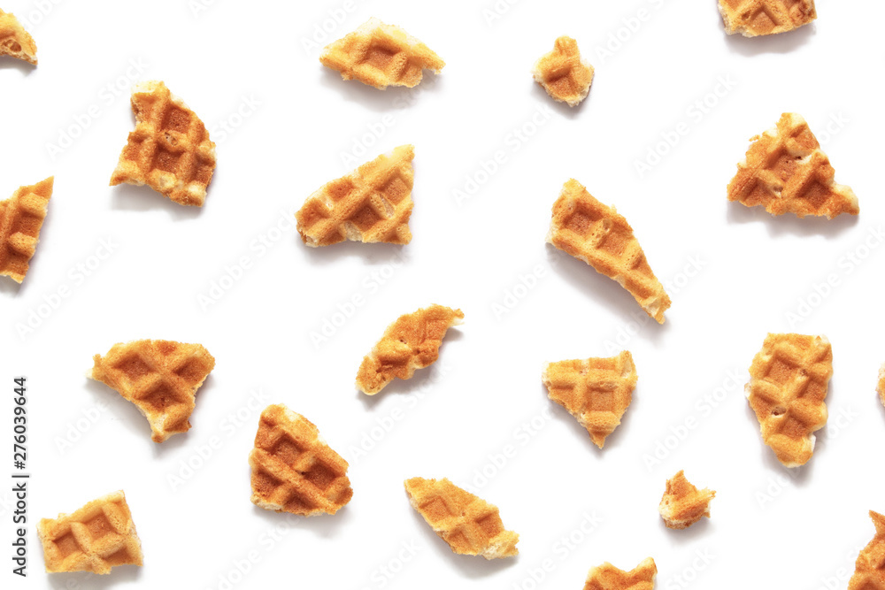Waffle texture. Wafer cone pieces isolated on white background.