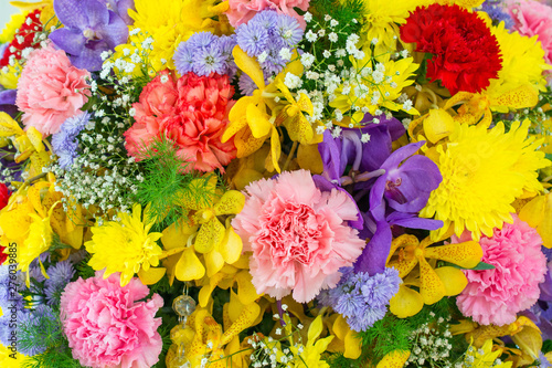 Abstract background with bunches of different varieties of colourful flowers. 