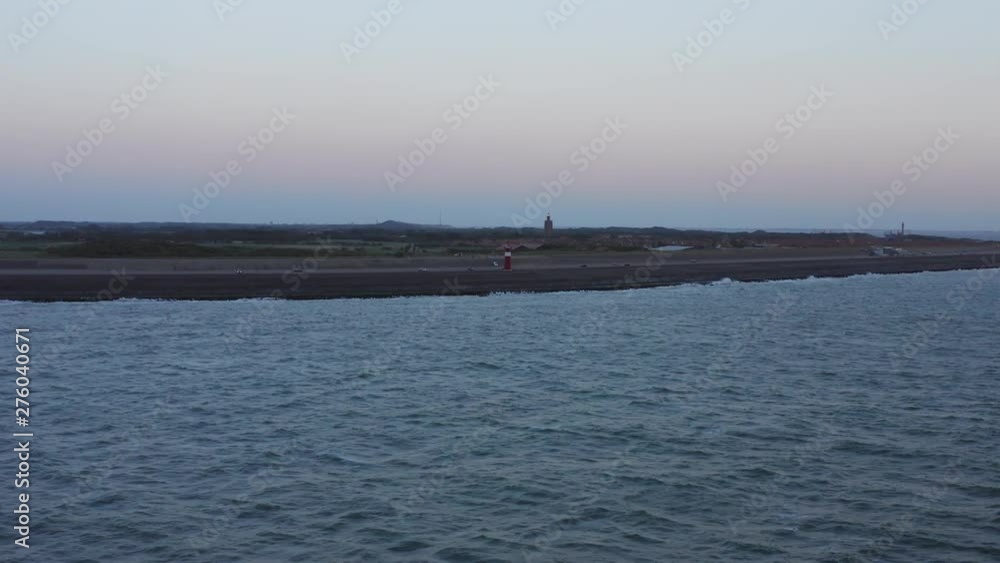 Lighthouse at Westkapelle after sunset. Aerial shot. Lighthouse at Westkapelle after sunset. Aerial shot.
