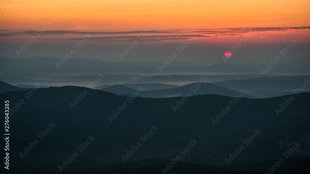 A beautiful sunrise in the mountains. A delightful summer landscape. Polonina Carynska. Bieszczady National Park. Poland.