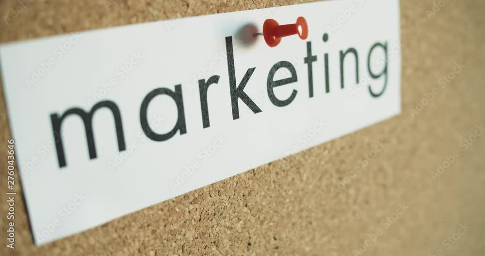 Sticky note: MARKETING - Pinned to cork wall - and removed Sticky note: MARKETING - Pinned to cork wall - and removed