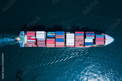 Aerial view of container cargo ship in import export business logistic photo