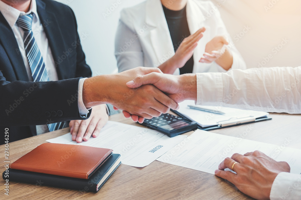 Business Shaking hands greeting new colleagues after during job interview Concept Business Shaking hands greeting new colleagues after during job interview Concept