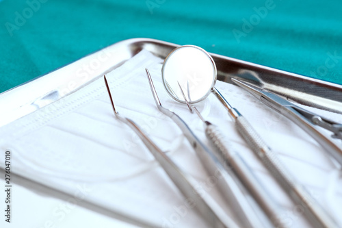Close up, Professional tools of dentist on stainless steel tray.