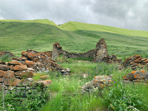 Russia, North Ossetia. Ruins of abandoned Ossetian villages in the Zryg Gorge photo