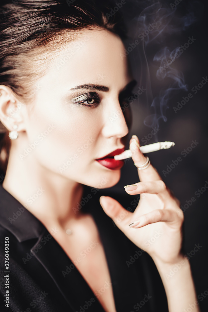 lady smoking cigarette Stock-Foto | Adobe Stock