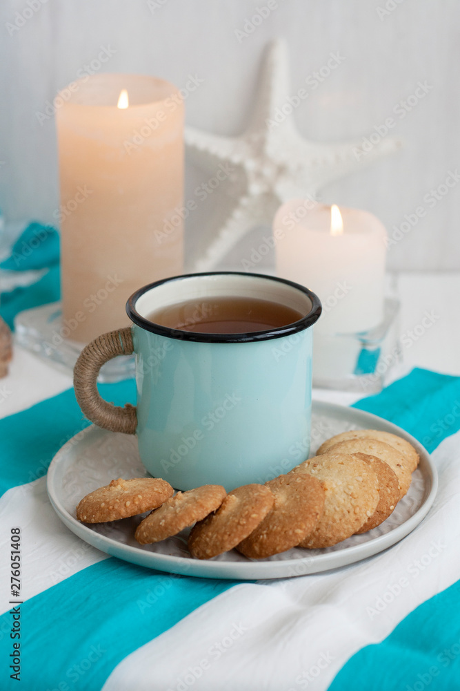 A study break: a mug of tea with cookies on a side. A study break: a mug of tea with cookies on a side.