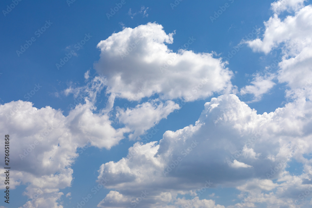 Blue sky and white, fluffy clouds Blue sky and white, fluffy clouds