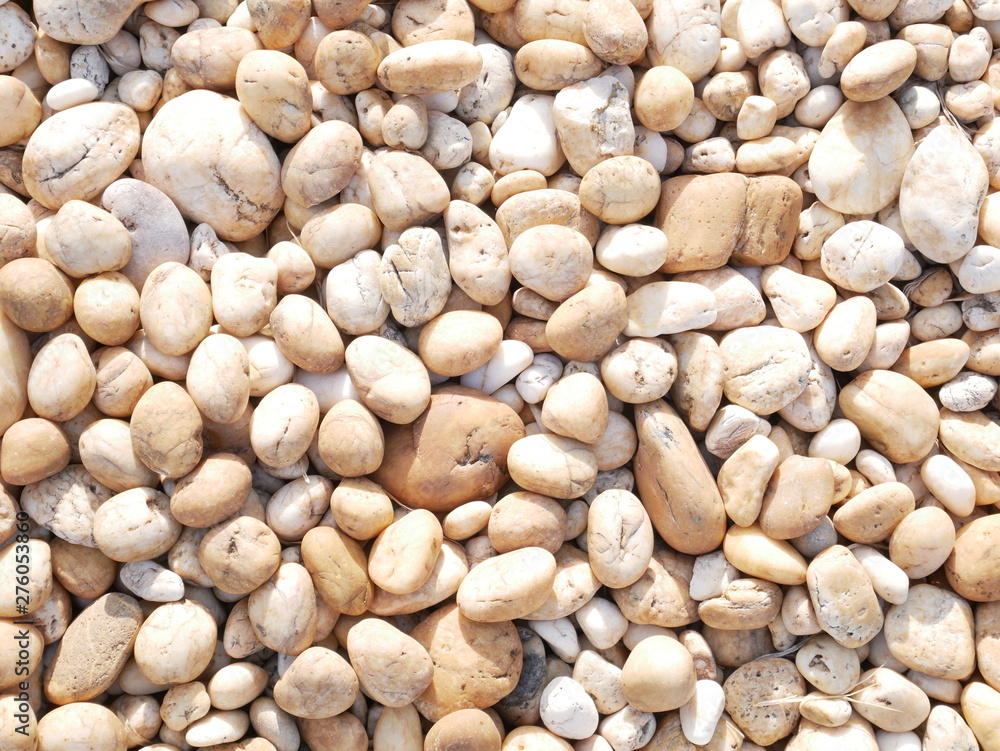 brown small stone background brown small stone background