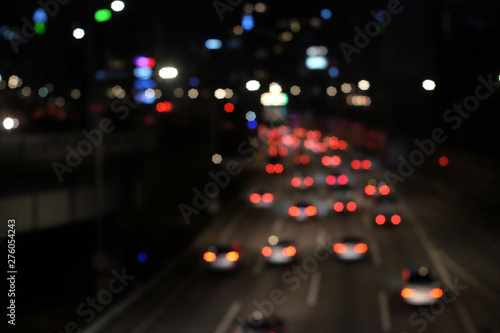 Bokeh blur of traffic lights in city at night