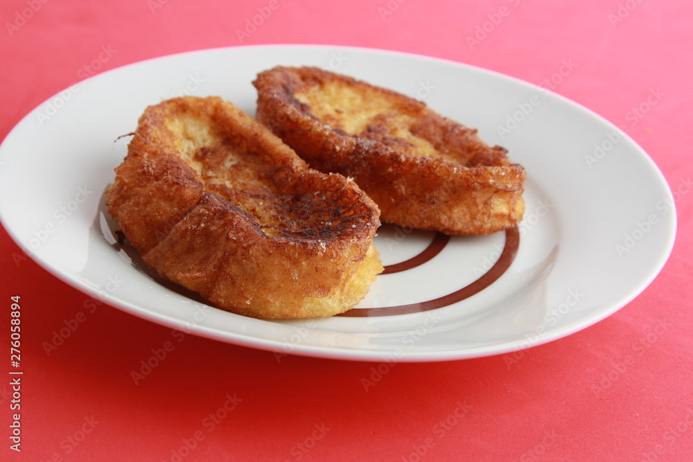The torrijas are a typical Spanish dessert that is eaten for Easter, are made with milk and bread The torrijas are a typical Spanish dessert that is eaten for Easter, are made with milk and bread