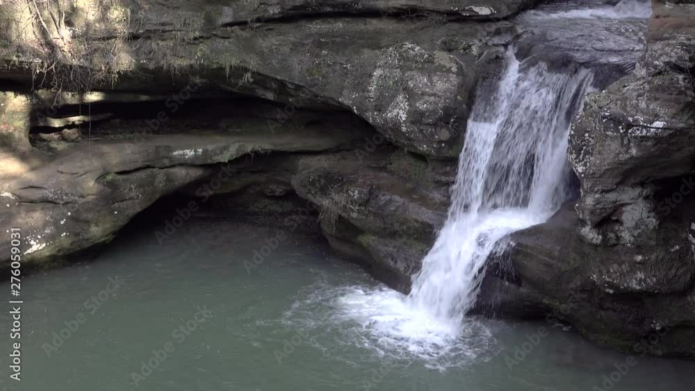 Waterfall coming down wall in forest 4k Waterfall coming down wall in forest 4k