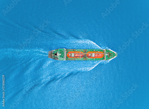 Aerial top view Oil ship tanker or LPG tanker transportation oil from refinery on the sea. © Pawinee