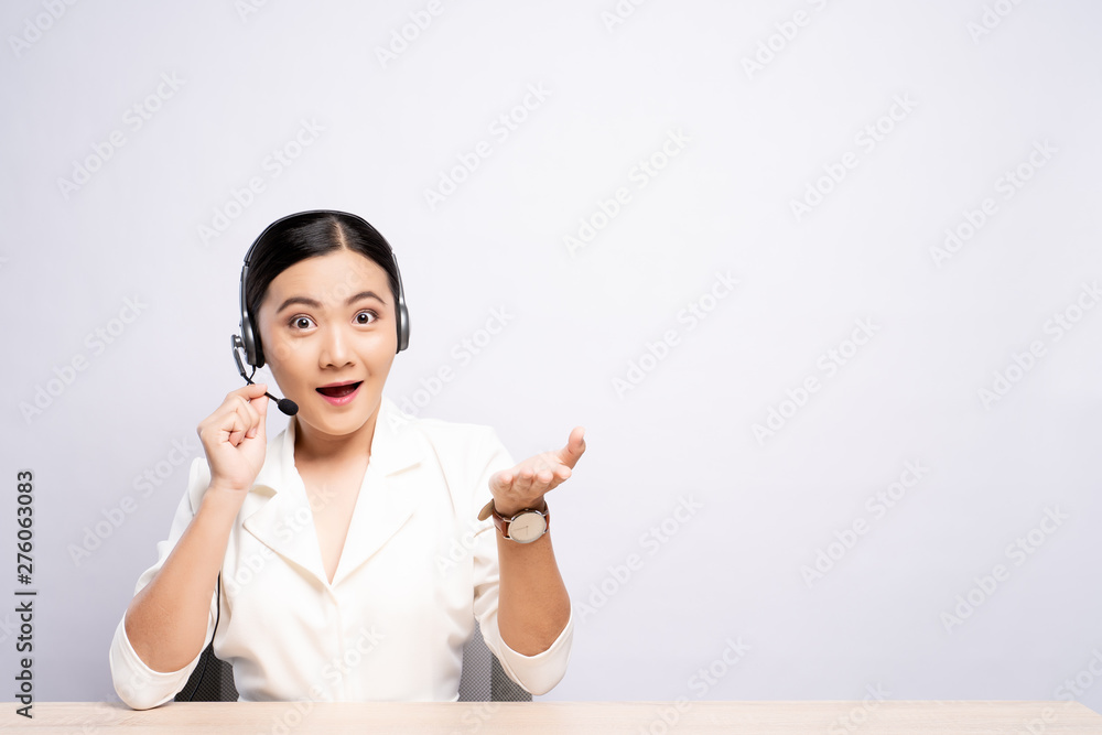 Woman operator in headset with blank copy space isolated white background Woman operator in headset with blank copy space isolated white background