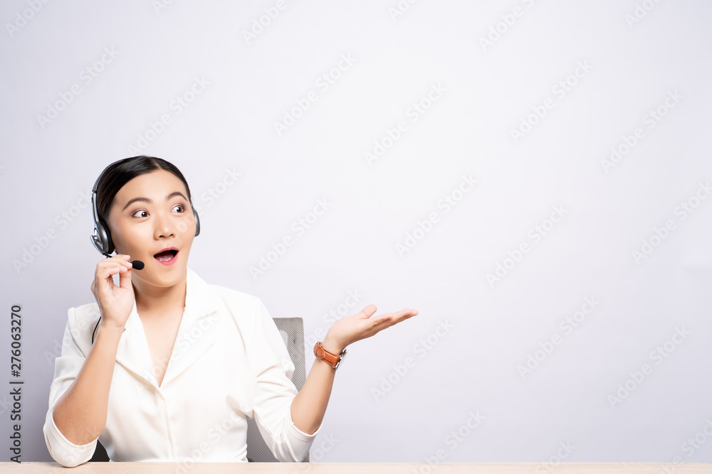 Woman operator in headset with blank copy space isolated white background Woman operator in headset with blank copy space isolated white background