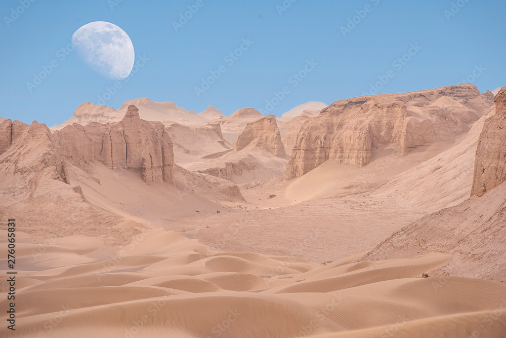 moon above the Lut desert,hottest desert in the world, also known like Kalut Desert