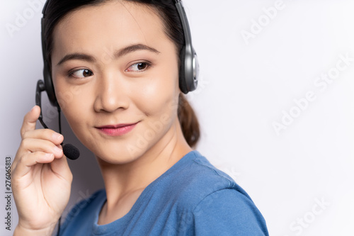 Close up shot of woman operator in headset isolated white background