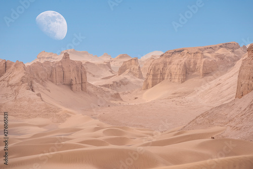 Obraz na płótnie moon above the Lut desert,hottest desert in the world, also known like Kalut Desert w salonie