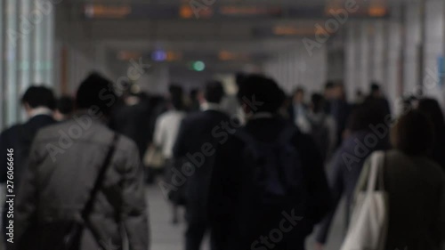 Wallpaper Mural TOKYO, JAPAN - CIRCA APRIL 2019 : Scenery of RUSH HOUR at SHINJUKU.  Back shot of unidentified crowd of people going back to home from work at night. Defocus shot. Torontodigital.ca