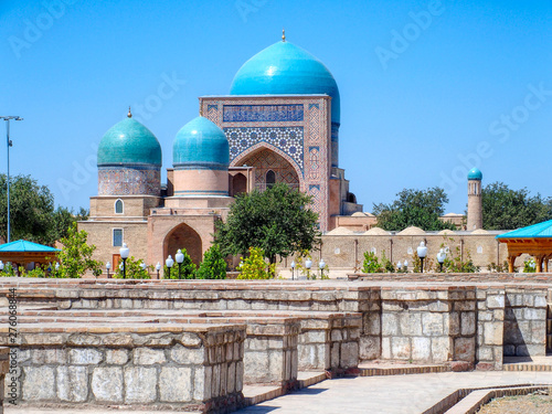 Traditional islamic art. Three turquoise domes of Kok Gumbaz Mosque, Shahrisabz, Uzbekistan photo